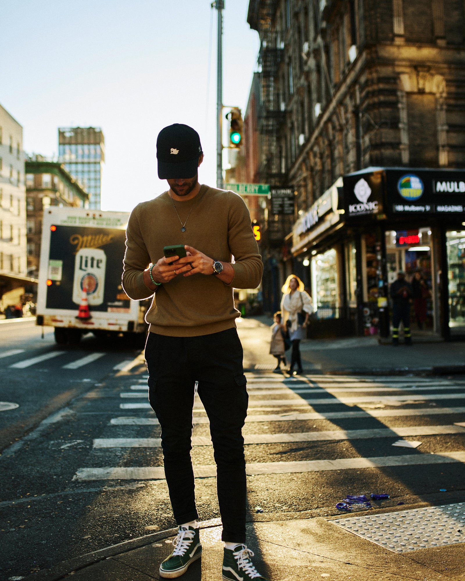 Fashionable MOOD Caps model wearing Flying Ghost streetwear cap in Space Black color in New York City