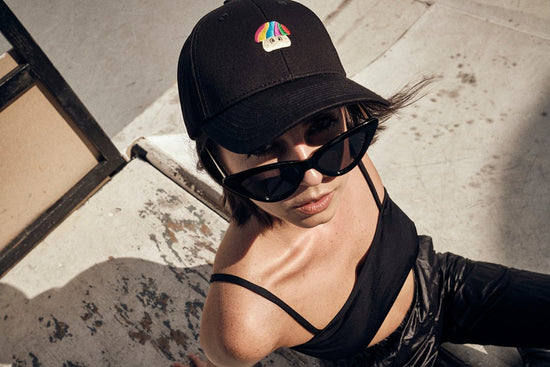 Shroom Space Black Baseball Hat - MOOD Caps model with sunglasses at skatepark