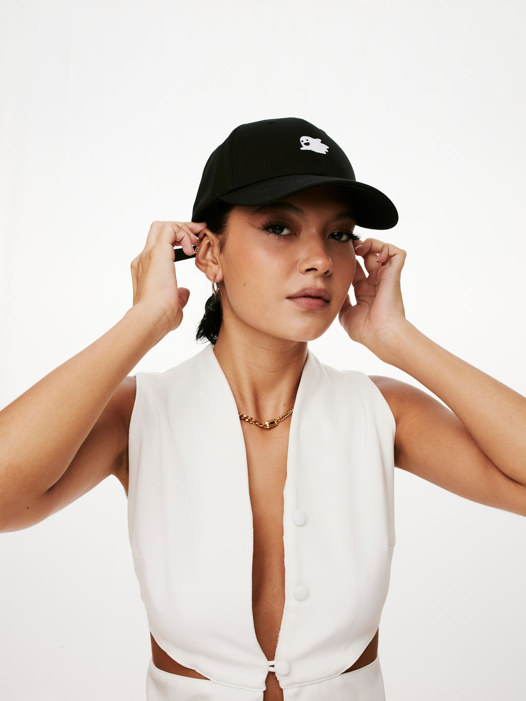 MOOD female model wearing Flying Ghost Baseball Cap in Space Black Color