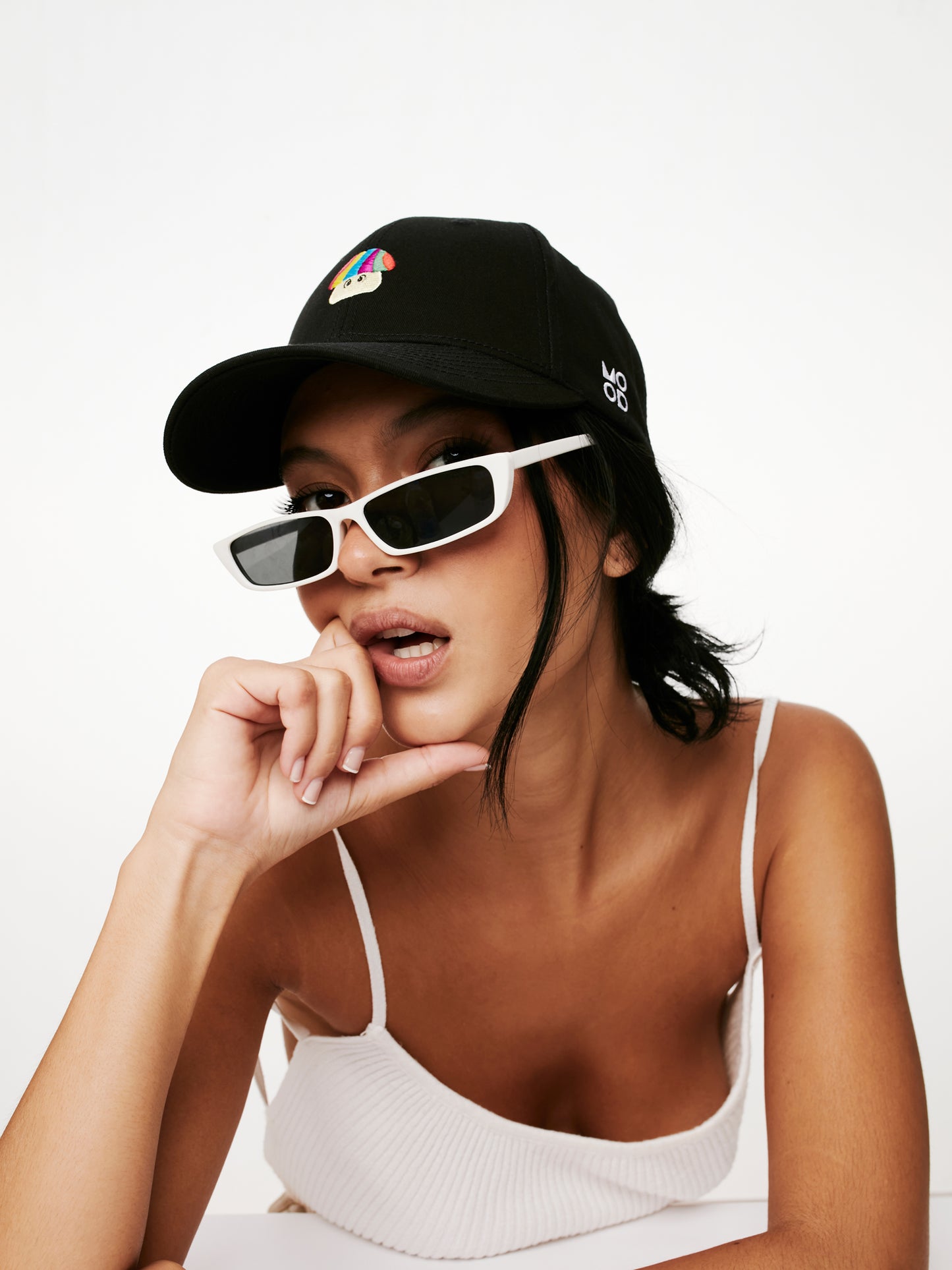 MOOD female model wearing Shroom baseball cap in black color product shoot