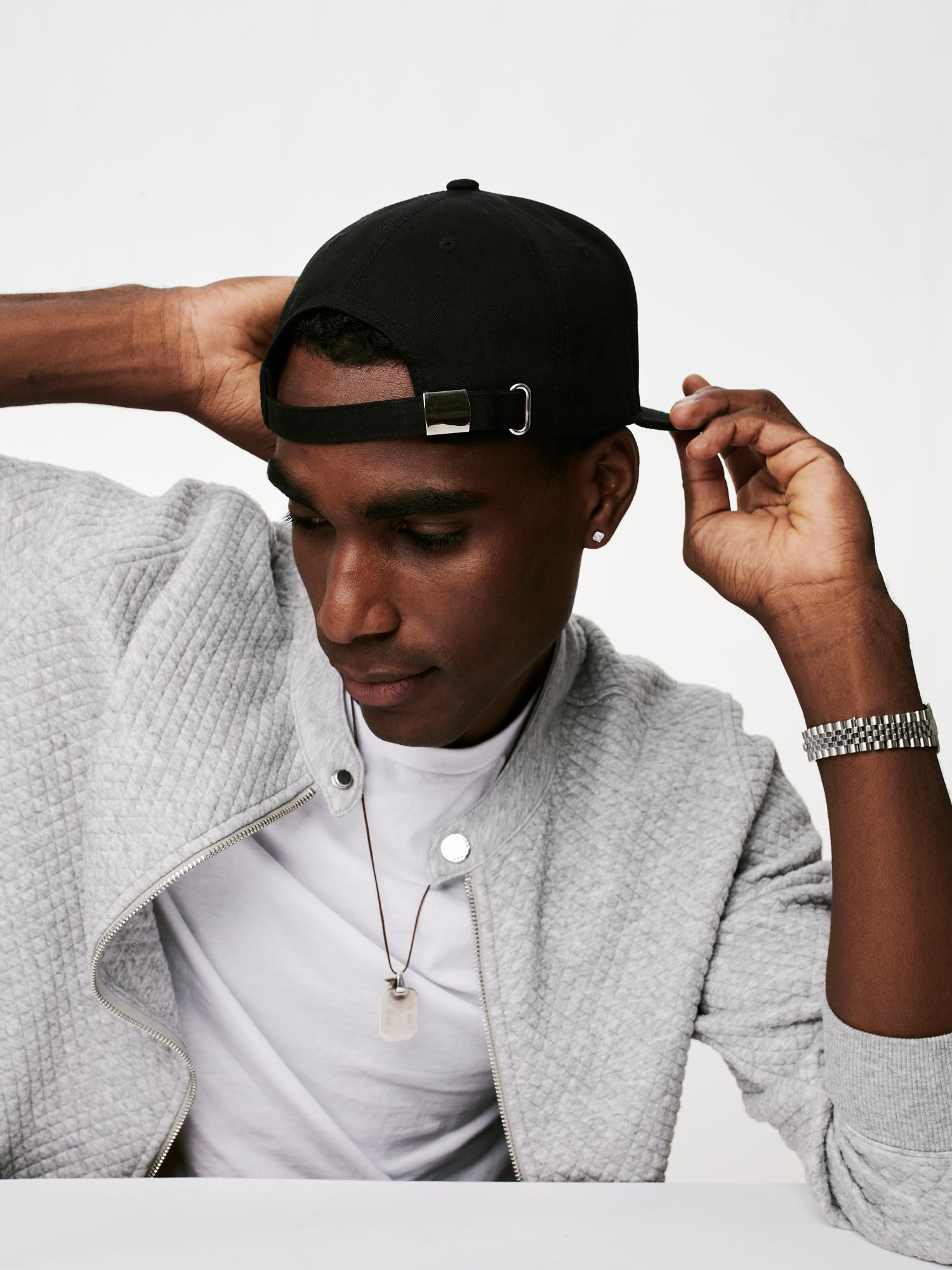 MOOD male model wearing MOOD baseball cap in black color backwards with swag